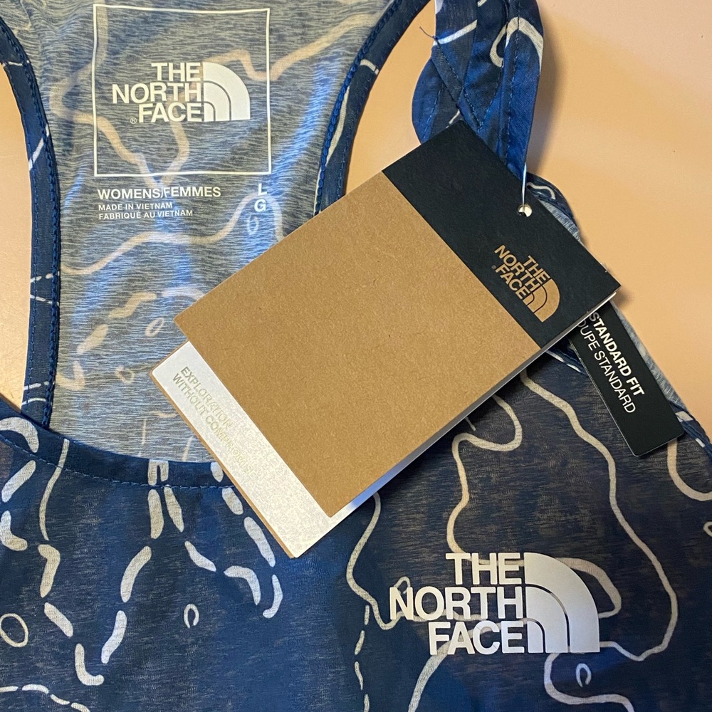 The North Face Sunriser Tank Top. Navy blue and white color.